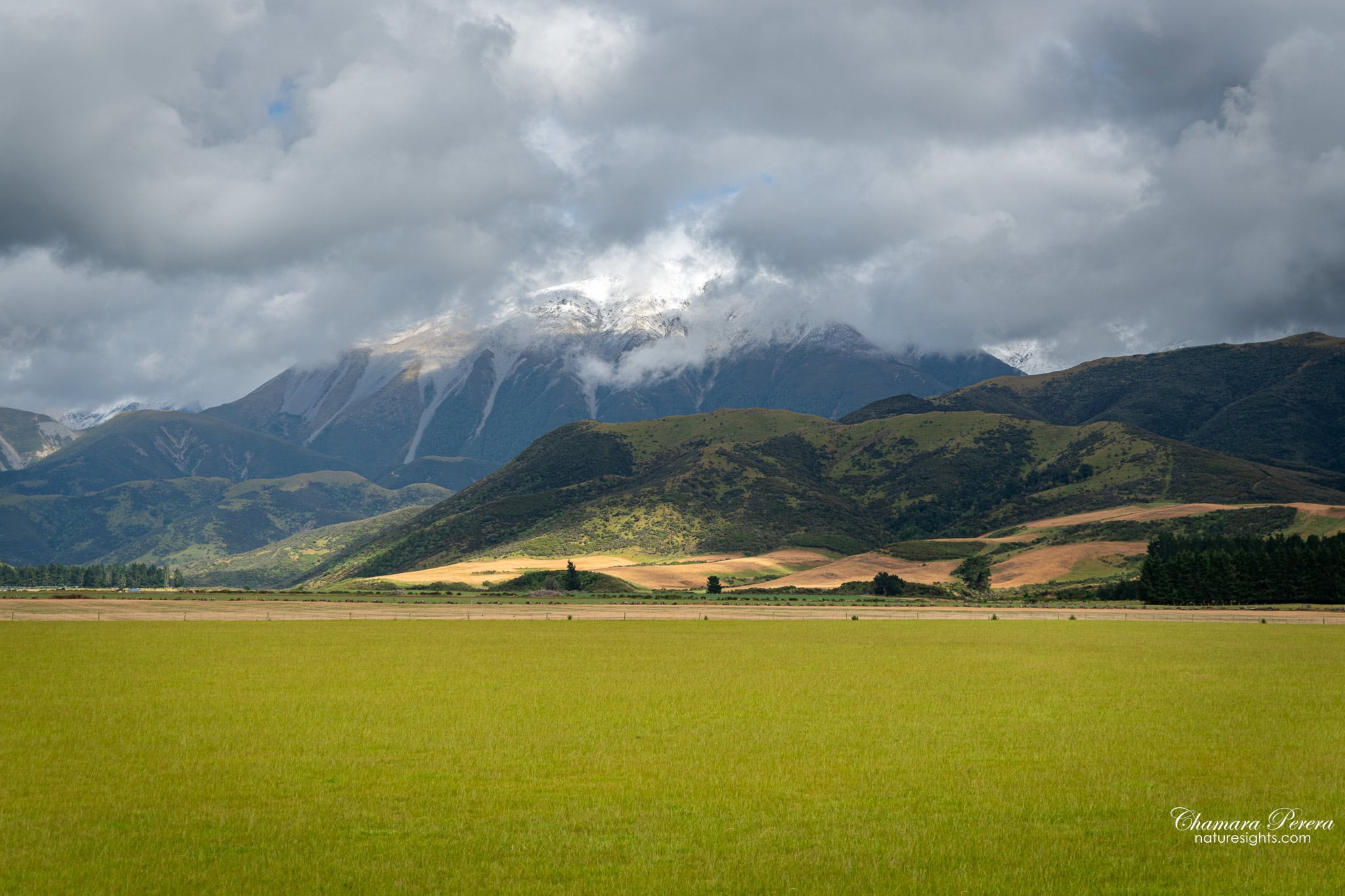 Snow-capped Southern Alps above Canterbury Plains TranzAlpine New Zealand
