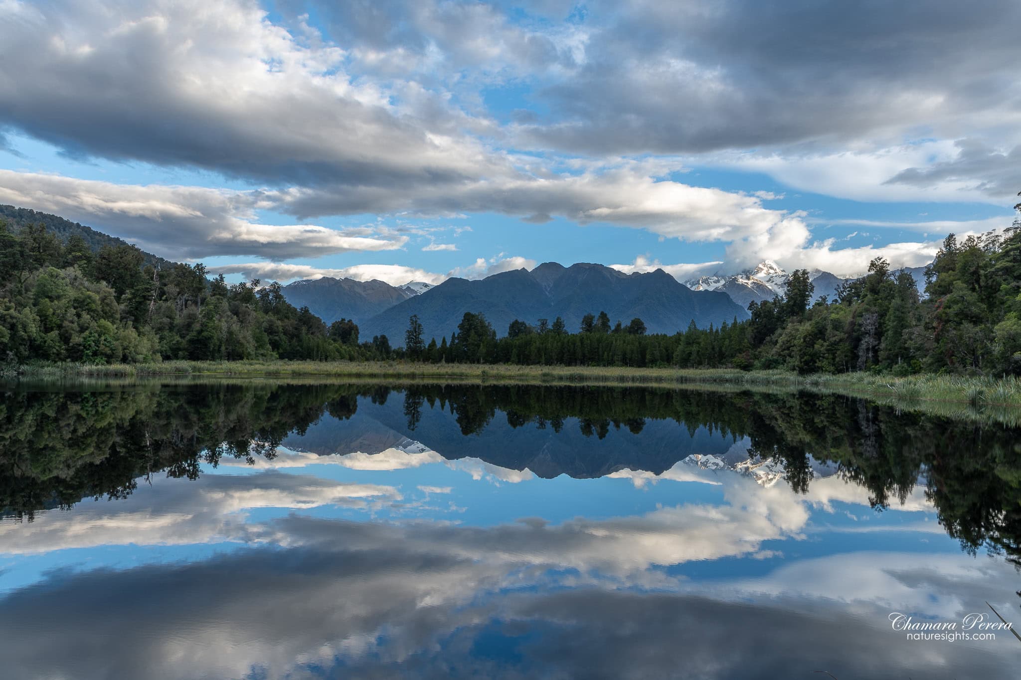 Perfect mirror reflection at Lake Matheson New Zealand