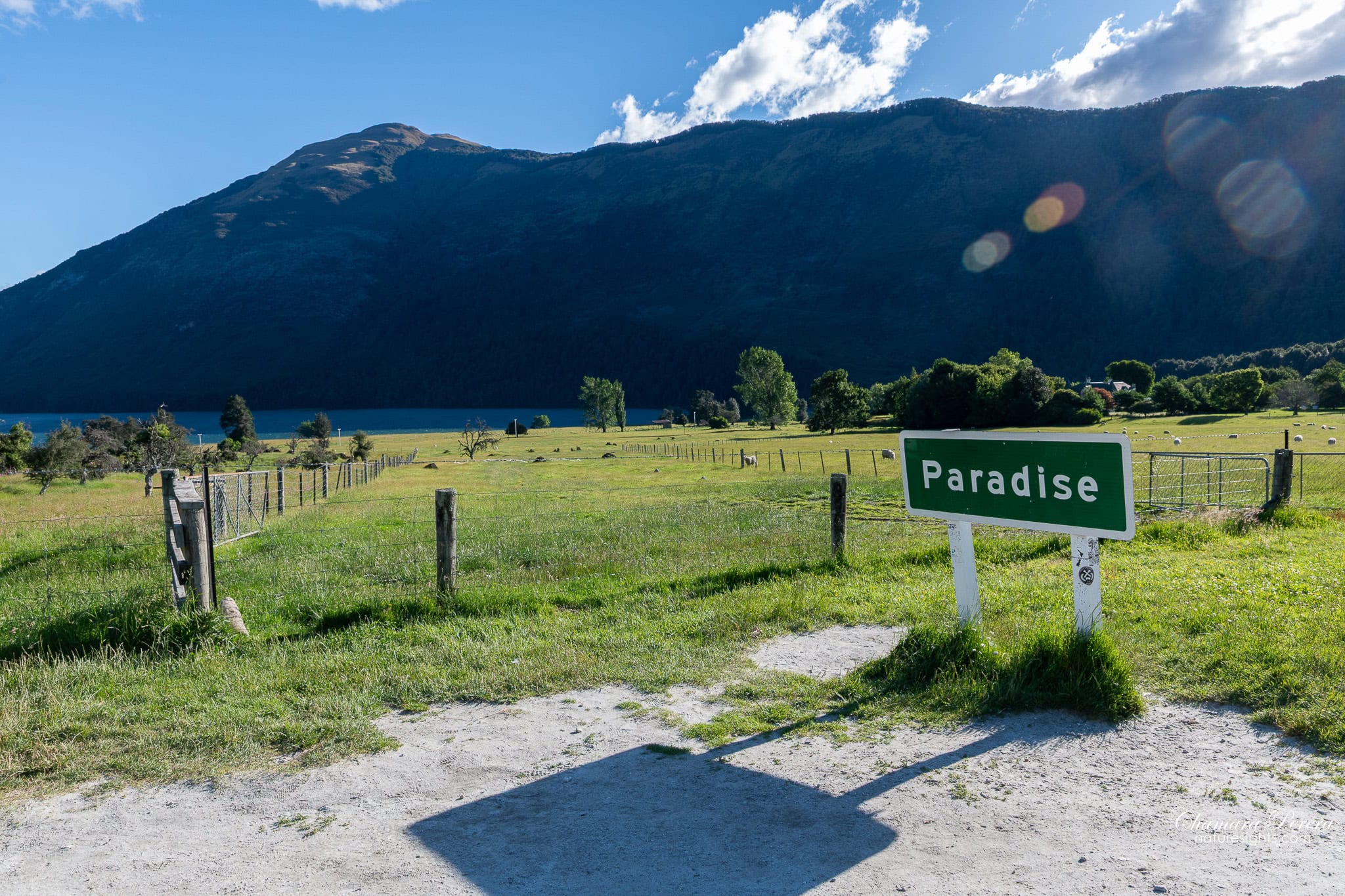 Paradise sign Lake Wakatipu farmland Glenorchy New Zealand