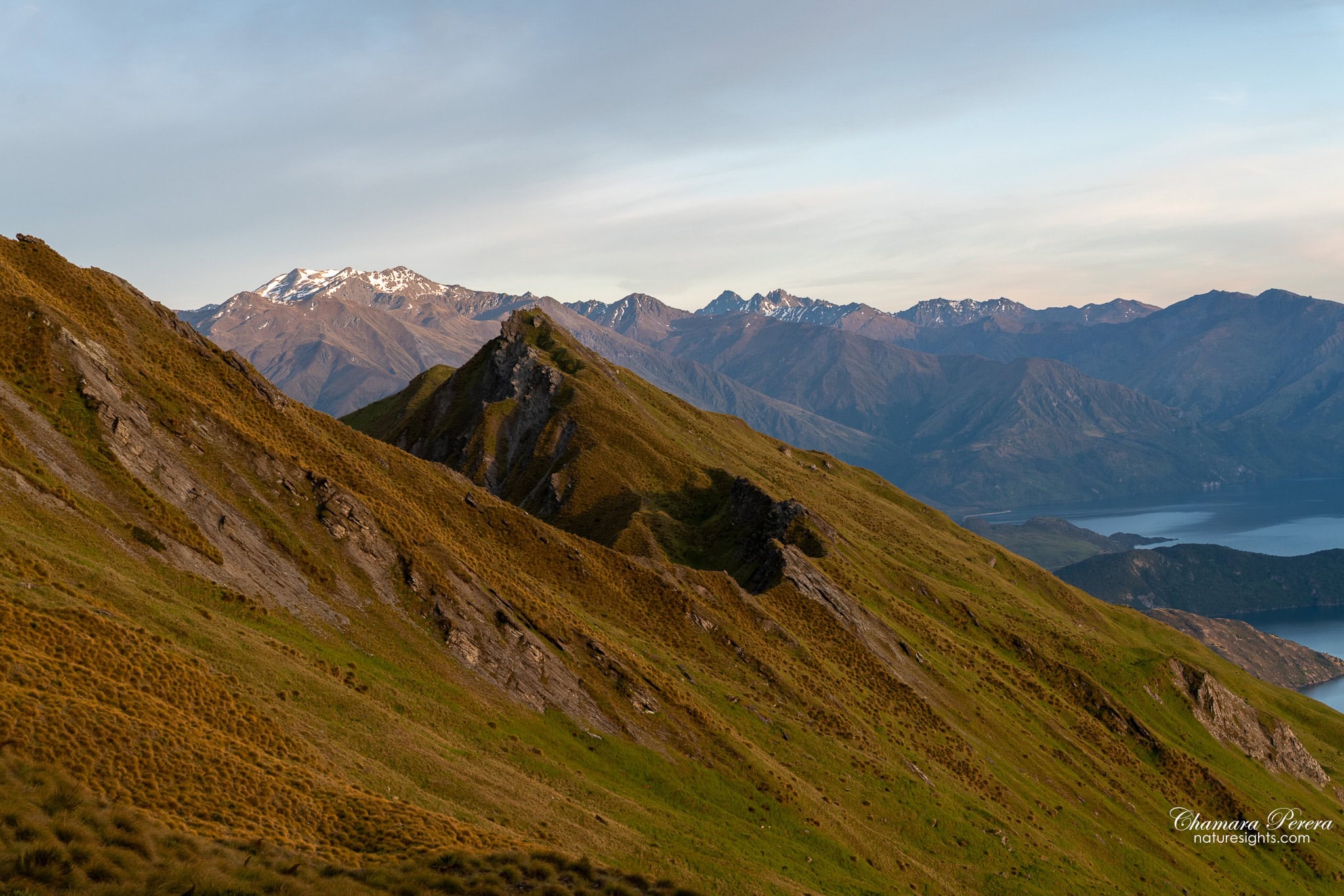 Roy's Peak rocky ridge with Lake Wanaka below at sunrise New Zealand
