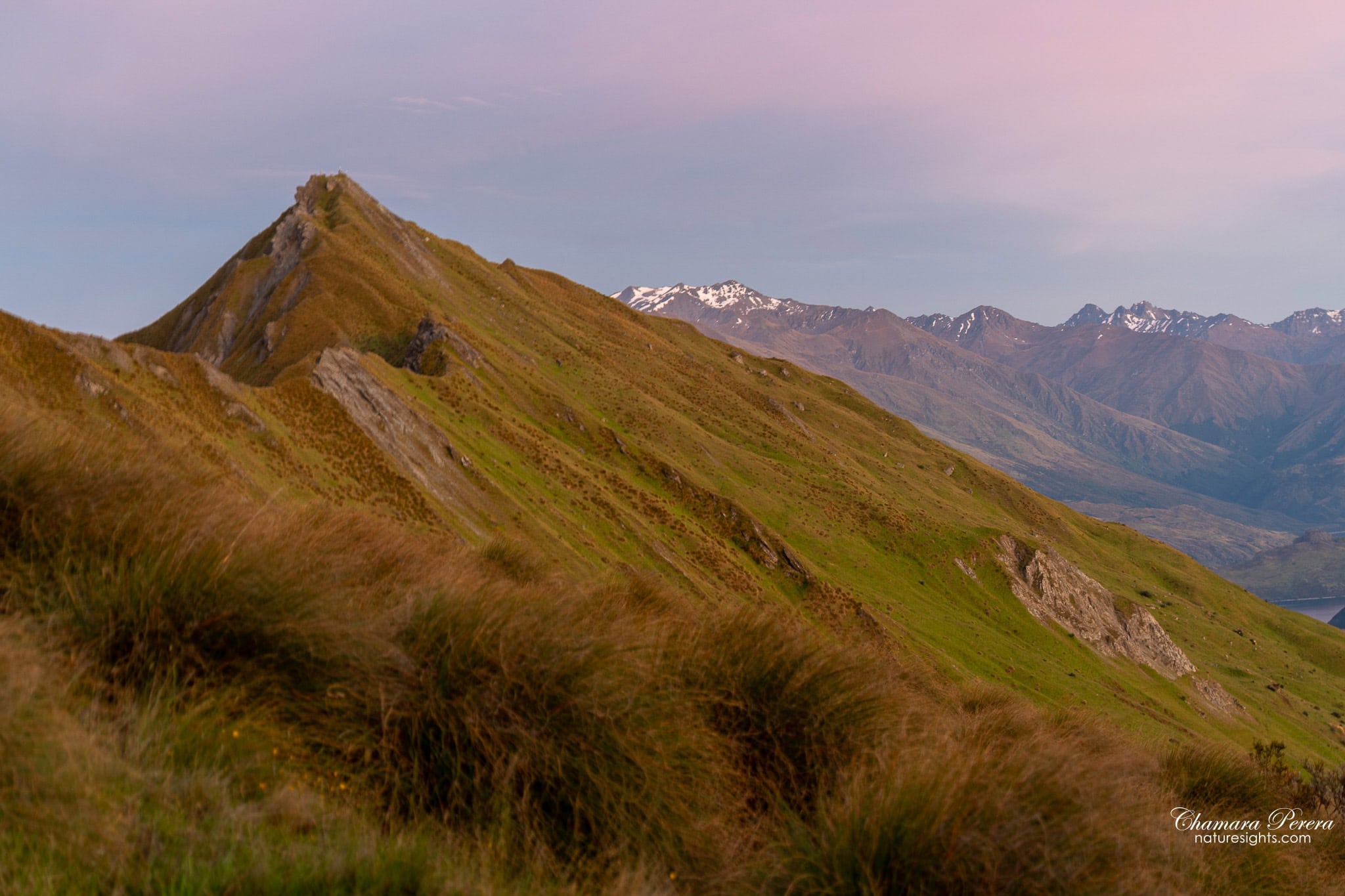 Roy's Peak sharp rocky ridge with snow-capped Southern Alps New Zealand