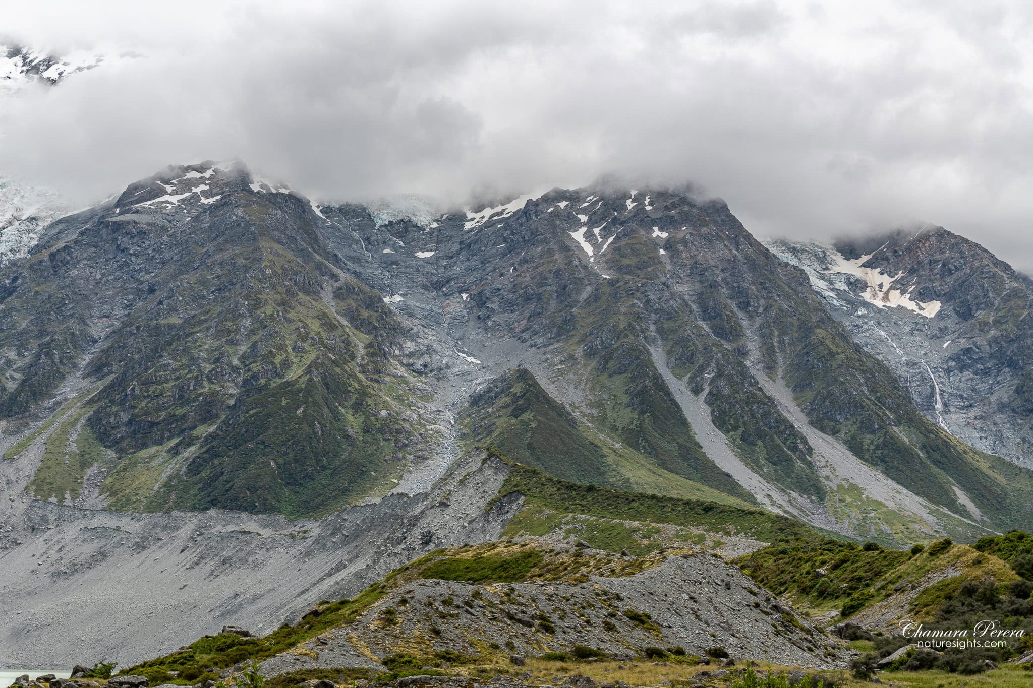 Hooker Lake with moraine and glacier face Aoraki Mount Cook New Zealand