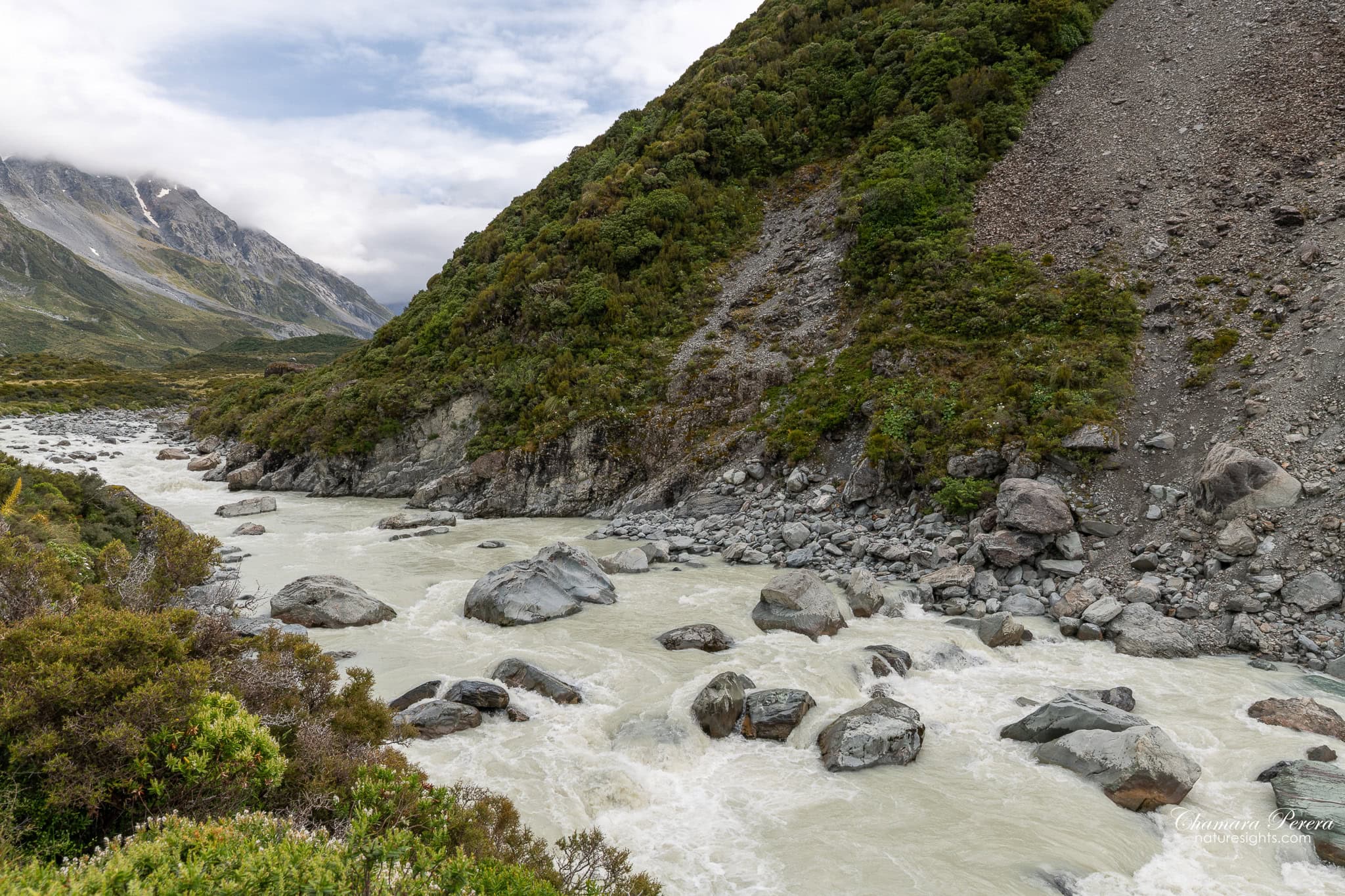 Hooker River flowing over rocky riverbed Mount Cook New Zealand