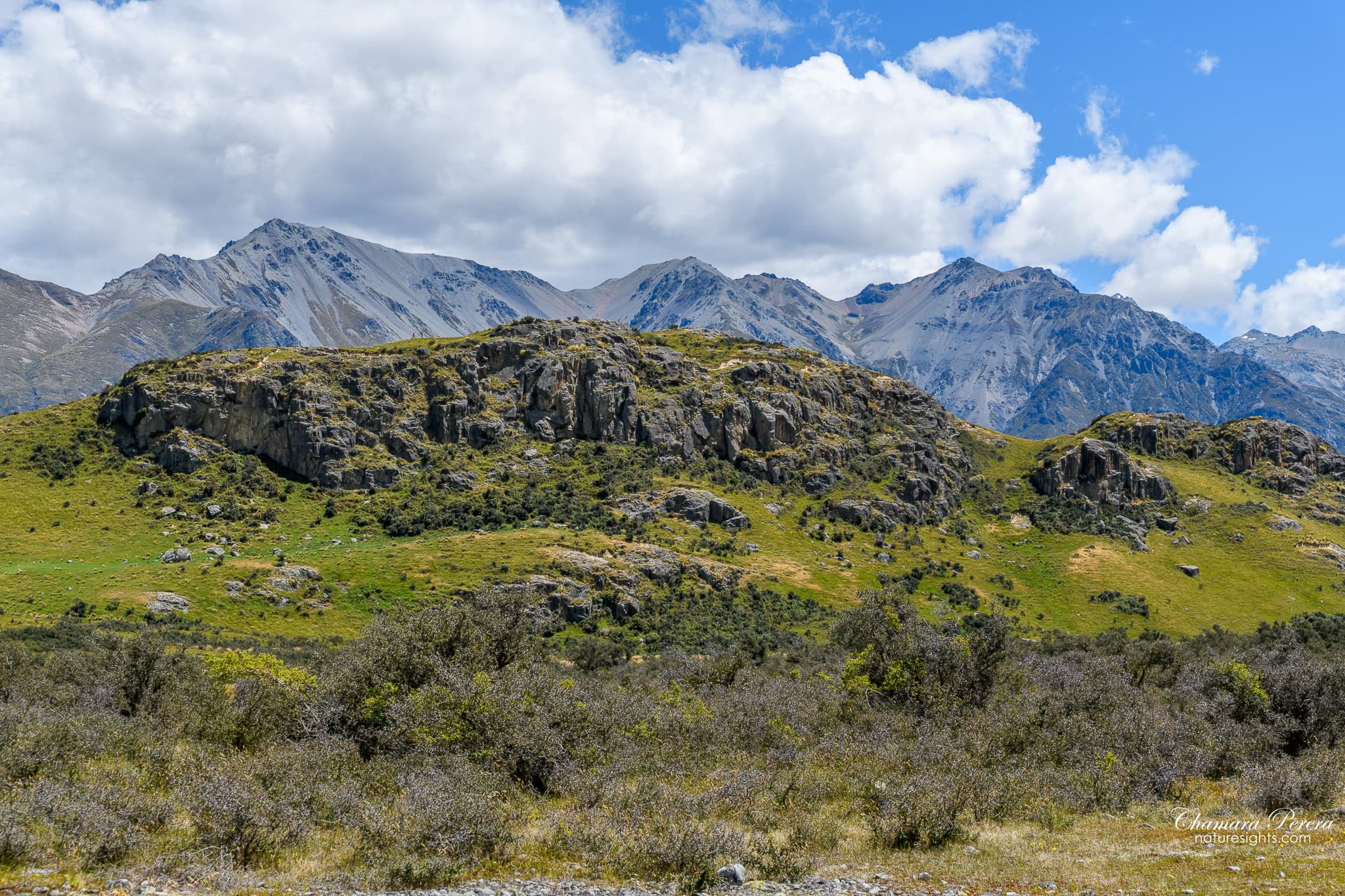 Mount Sunday hill rocky summit viewed from valley floor New Zealand