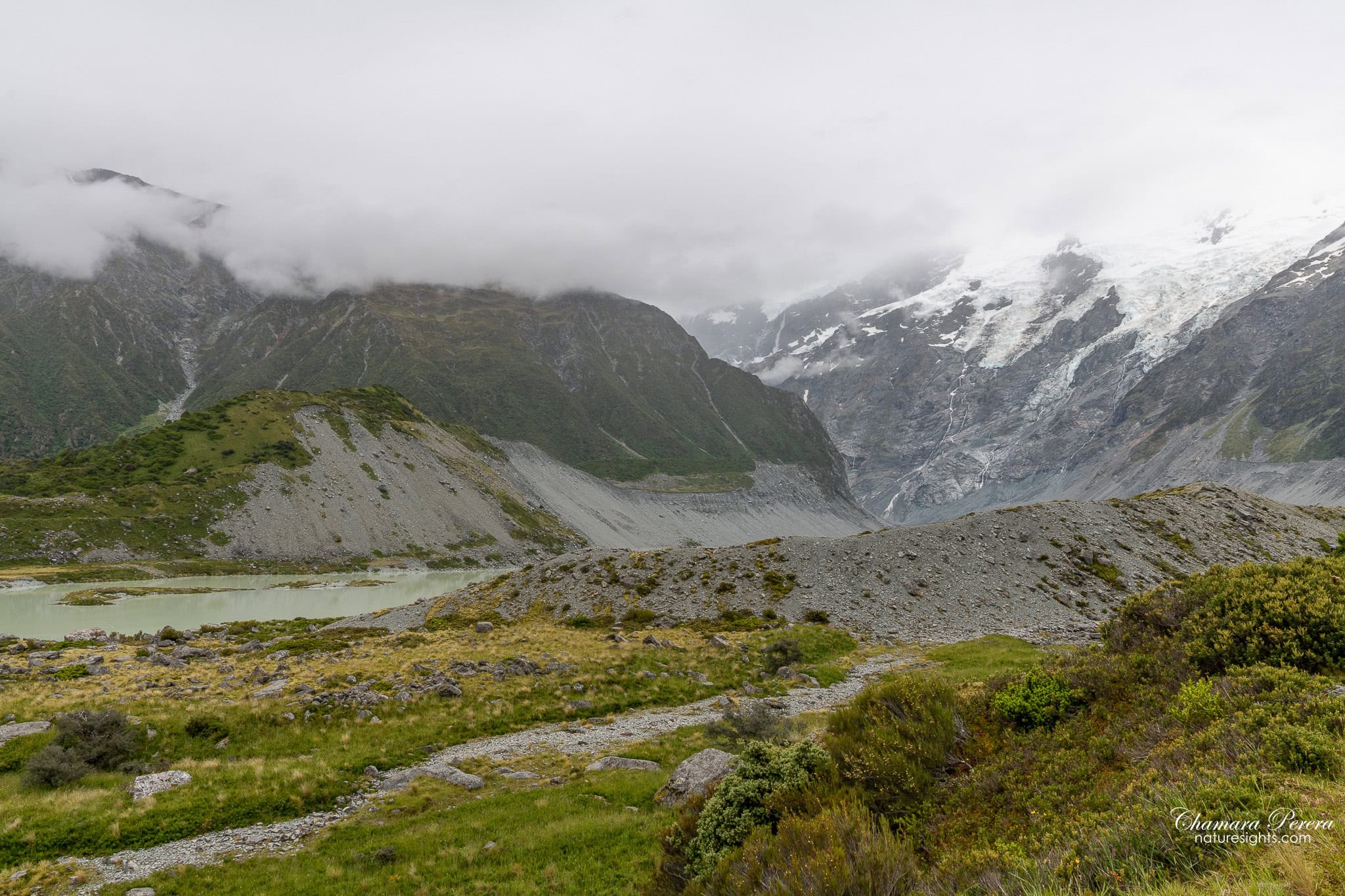 Mueller Lake with moraine slopes and rocky terrain Mount Cook New Zealand